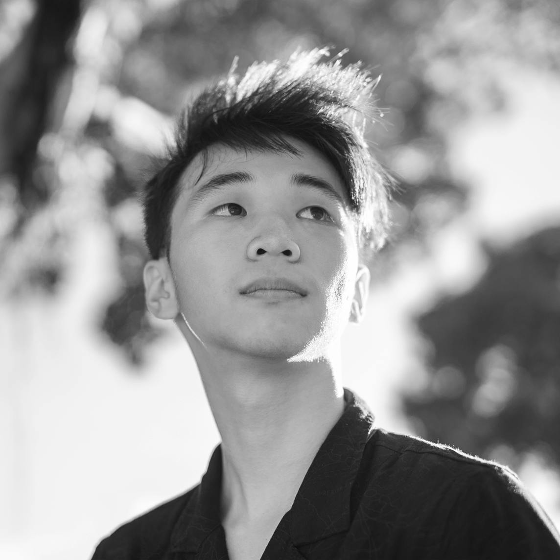 Matthew Wang in black and white